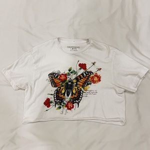Cropped butterfly graphic tee from Marshall’s. Great condition!